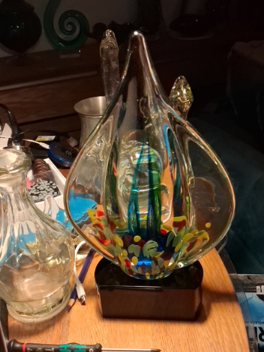 Murano-style art glass teardrop sculpture with multicolored internal design