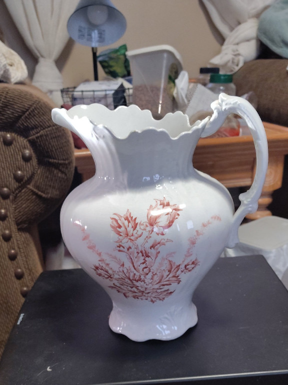 Porcelain water pitcher with red floral transfer decoration