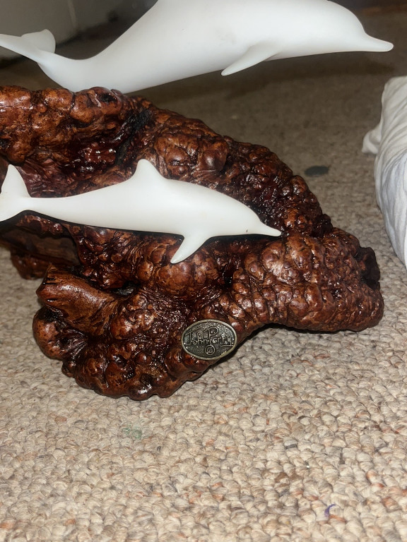 Burl wood sculpture titled 'Pellucida' by John Perry