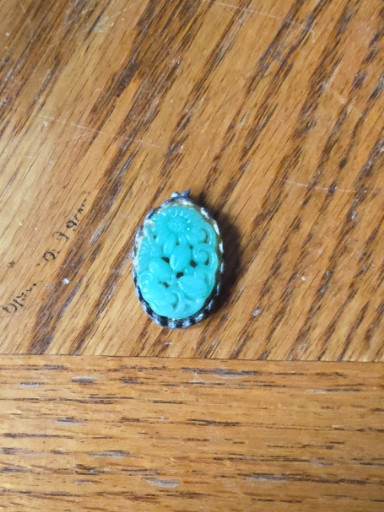 Vintage carved turquoise glass or resin cameo brooch or pendant in brass setting