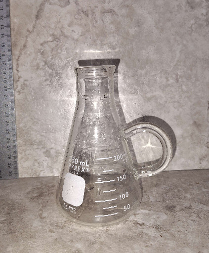 Glass laboratory filtering flask (Buchner flask) with side arm, 250ml capacity, manufactured by Pyrex