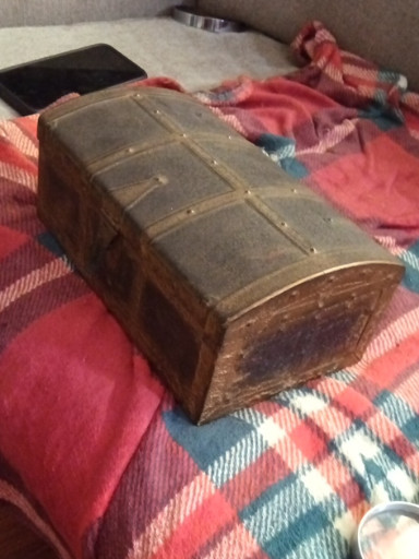 Vintage tin treasure chest box with embossed antique