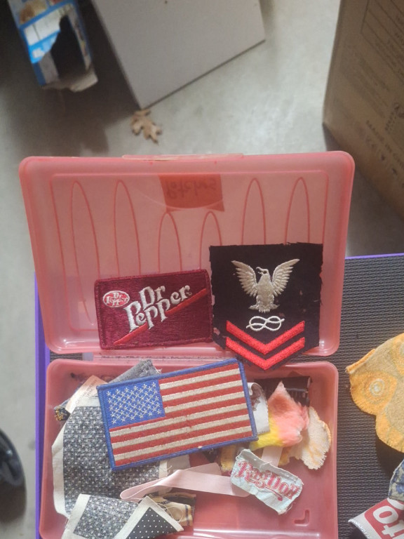 Collection of vintage patches including Dr Pepper soda logo patch, US Navy petty officer patch, and American flag patches