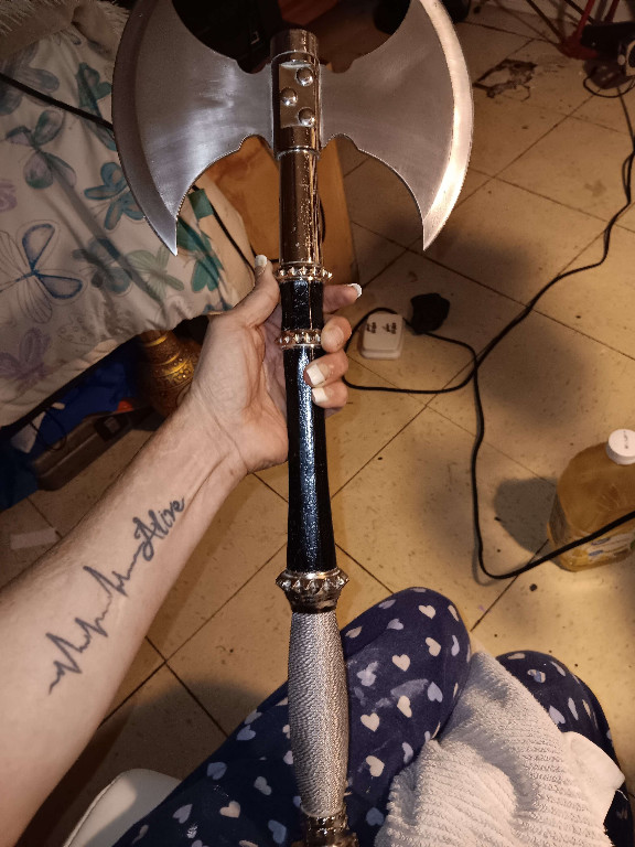 Decorative double-bladed battle axe with wrapped handle