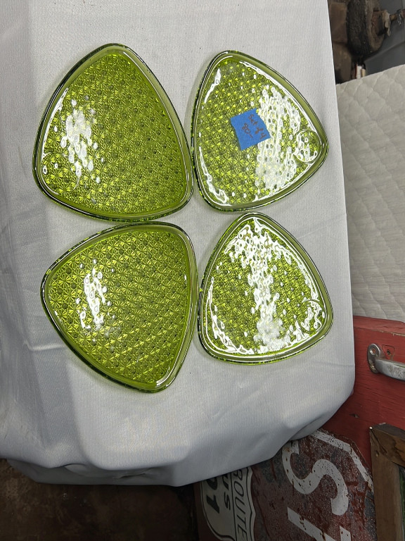 Pressed glass snack plates in 'Daisy and Button' pattern by Indiana Glass Company