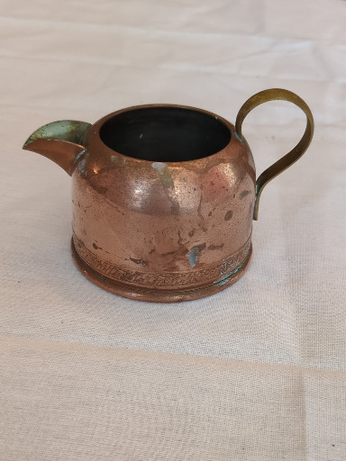 Copper creamer or small pitcher with brass handle