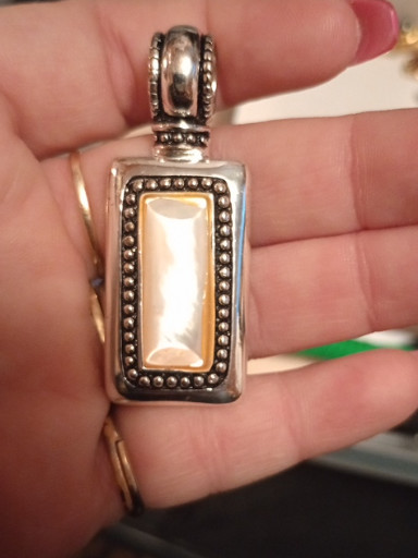 Silver-plated pendant with mother-of-pearl inset by Premier Designs