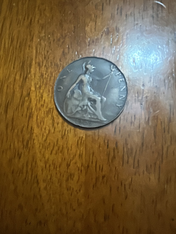 British One Penny coin featuring Britannia