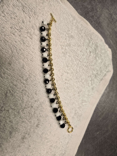 Gold-tone chain bracelet with black and white beaded floral accents by R.J. Graziano