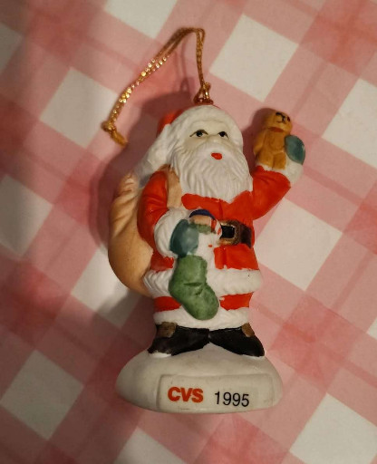 Porcelain Christmas ornament titled 'Santa Claus with Toy Sack' by CVS Pharmacy Traditions