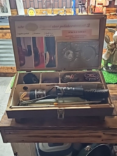 Vintage shoe polishing and grooming kit in wooden case