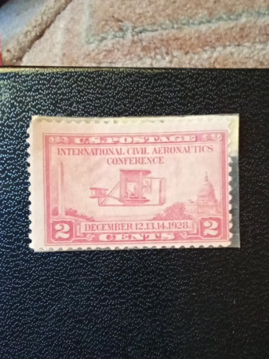 United States postage stamp Scott #649 titled 'International Civil Aeronautics Conference' featuring the Wright Brothers Airplane