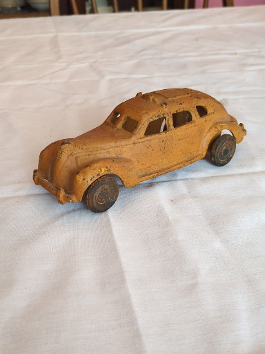Cast iron toy sedan styled as a 1930s taxi cab