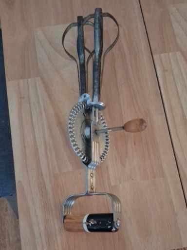 Vintage A&J EKCO stainless steel hand-crank egg beater with wooden handle
