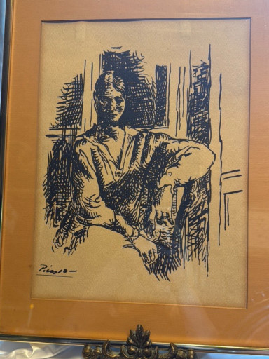 Ink drawing on paper depicting a seated figure reading