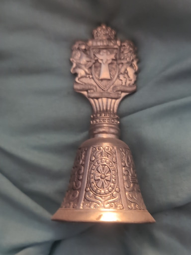 Pewter bell titled 'TBN Bethlehem Collectors Bell' made in Spain