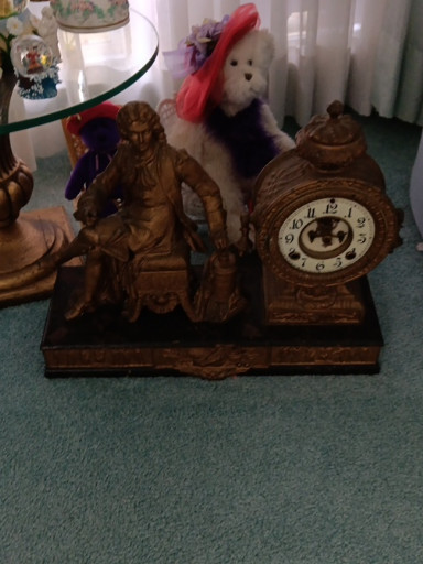 Cast metal figural mantel clock titled 'Denis Papin' by Ansonia Clock Company