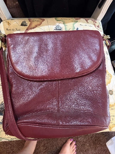 Vintage burgundy leather crossbody bag by Coach