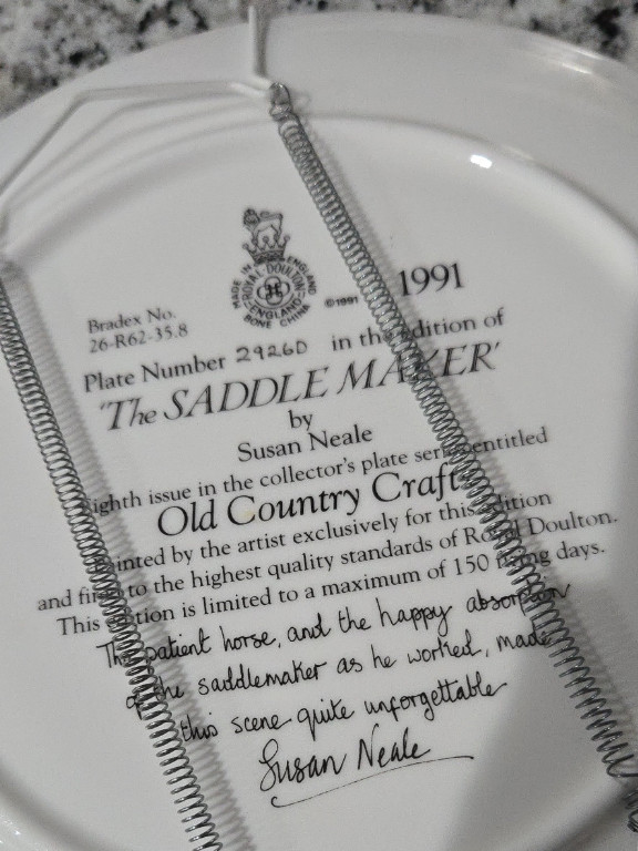 Porcelain collector's plate titled 'The Saddle Maker' by Susan Neale for Royal Doulton