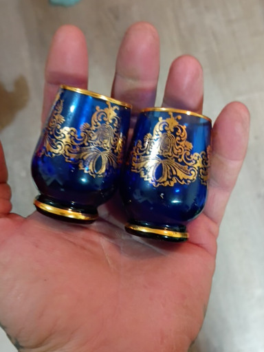 Pair of cobalt blue glass tumblers with gold enamel decoration