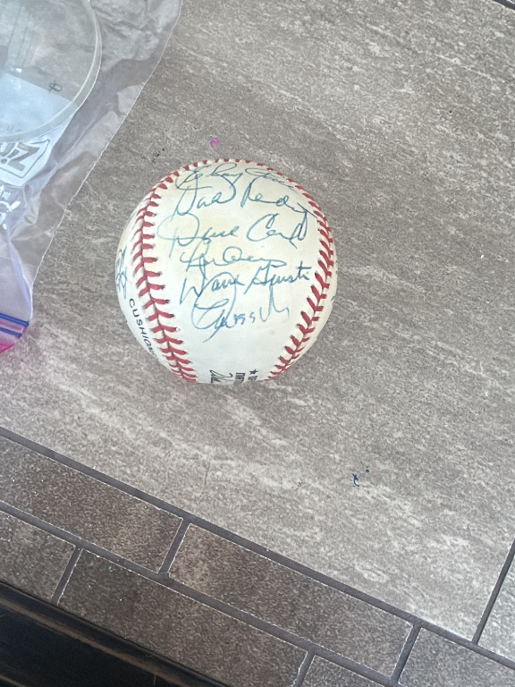 Autographed baseball with multiple signatures from San Francisco Giants players