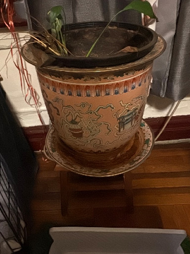 Chinese porcelain jardinière planter with matching saucer featuring hand-painted dragon and floral motifs
