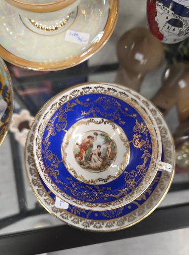 Porcelain demitasse cup and saucer set with cobalt blue ground and gilt decoration by Bremer & Schmidt (BES)