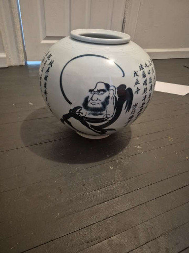 Porcelain moon jar with blue and white calligraphy and figural decoration by Do Young