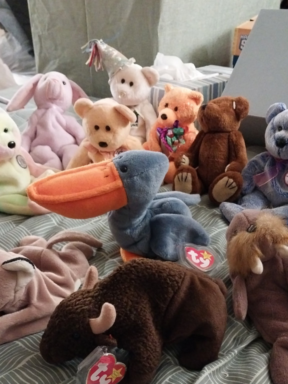 Collection of Ty Beanie Babies plush toys including Roam the Buffalo