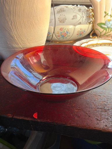 Ruby red glass bowl with fluted rim