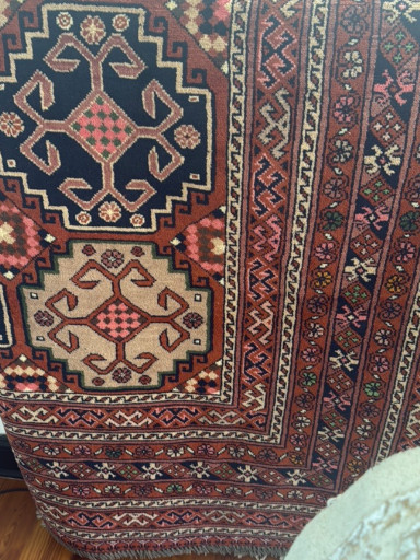 Hand-knotted wool rug with Caucasian geometric motifs from Quba region