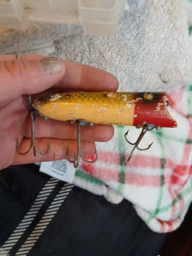 Vintage wooden fishing lure, likely Heddon or similar American manufacturer