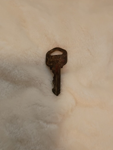 Vintage iron or steel utility key, heavily rusted