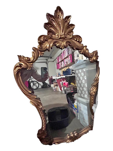 Rococo-style ornamental wall mirror with gilt finish