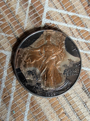 Silver bullion coin titled "American Silver Eagle" by United States Mint