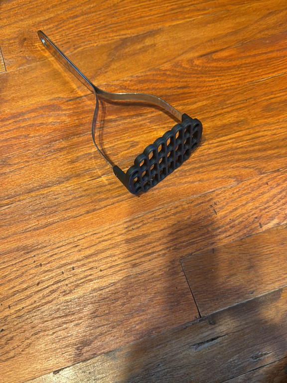 Cast iron potato masher