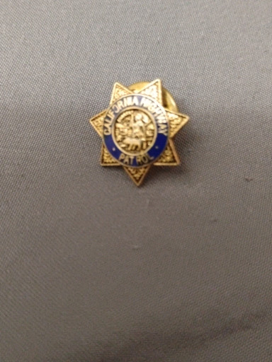 Metal police badge pin from the California Highway Patrol (CHP)