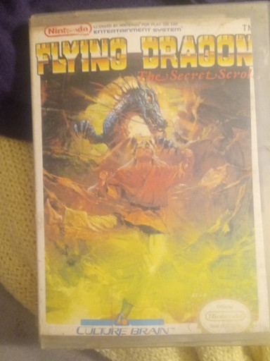 Nintendo Entertainment System (NES) game titled 'Flying Dragon: The Secret Scroll' by Culture Brain