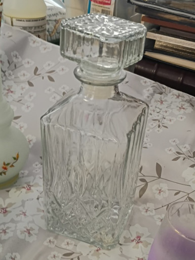 Cut glass whiskey decanter with stopper