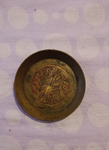 Brass decorative bowl with etched foliate design