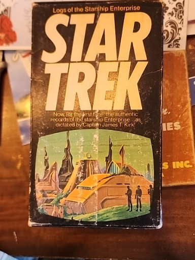 Paperback book box set titled 'Logs of the Starship Enterprise: Star Trek' by Alan Dean Foster