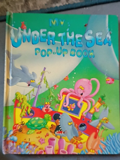 Children's pop-up book titled 'Under the Sea Pop-Up Book' by Gill Guile