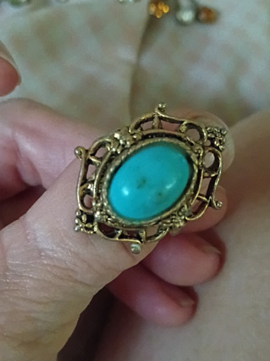 Vintage gold-tone filigree ring with faux turquoise cabochon