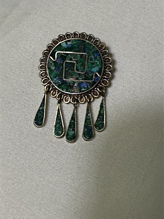 Sterling silver brooch with crushed turquoise inlay from Taxco, Mexico