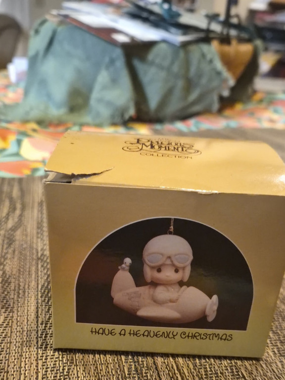 Porcelain ornament titled 'Have A Heavenly Christmas' by Precious Moments Collection