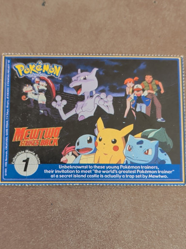 Pokémon 'Mewtwo Strikes Back' promotional trading card set from Burger King, featuring Scene 1 and Charmander #04
