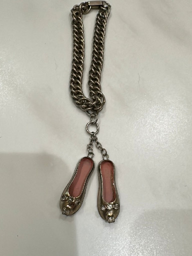 Silver-tone charm bracelet with pink enamel ballet slipper charms