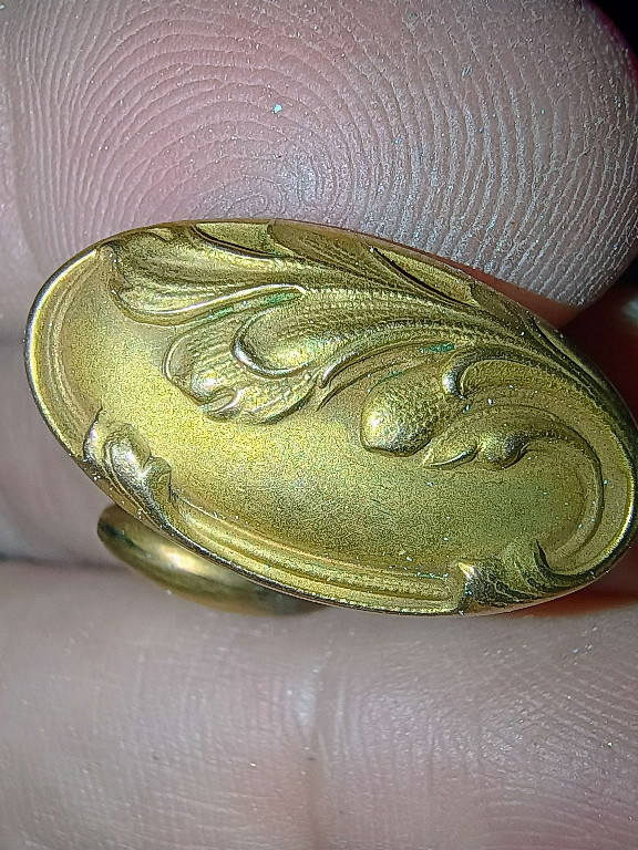 Gold-plated brass cufflink with Art Nouveau floral design