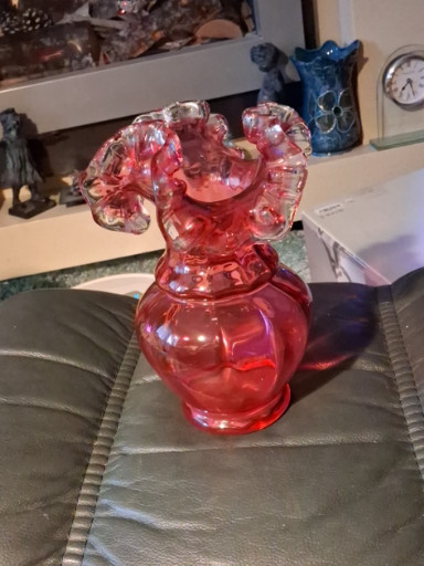 Cranberry glass vase with ruffled scalloped rim