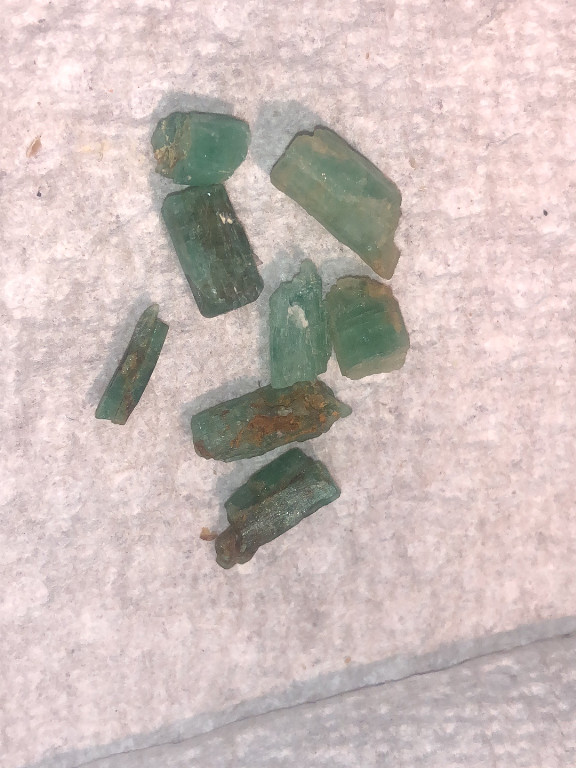 Raw green emerald crystals from Afghanistan